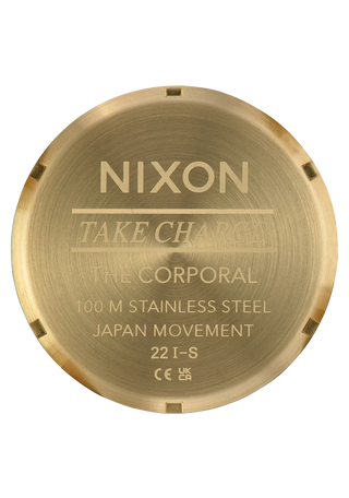 Nixon Corporal Stainless Steel watch in All Gold with a black dial, raised bezel, and faceted bracelet.