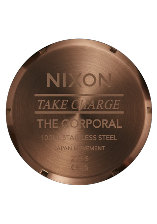 Nixon Corporal Chocolate/Dark Roast analog watch with stainless steel bracelet and rugged brown field-style dial.