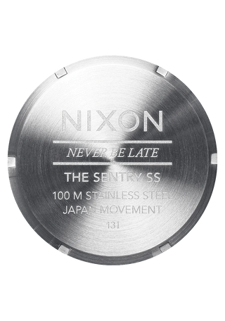 Image of the Nixon Sentry Stainless Steel Blue Sunray watch, showcasing its silver design and stainless steel bracelet.