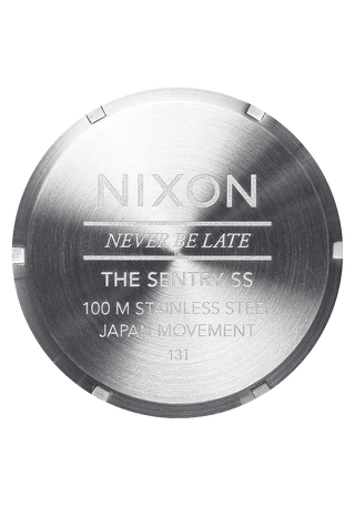 Nixon Sentry Blue Sunray analog watch with stainless steel bracelet and textured blue sunray dial.