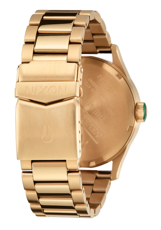 Nixon Sentry Gold/Green Sunray analog watch with gold stainless steel bracelet and green sunray dial.