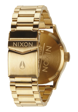 Nixon Sentry Stainless Steel Watch in Yellow Gold with Black dial, day/date display, and stainless steel bracelet.