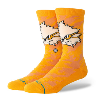 Stance Pokémon Trainer Box Set — 30th Anniversary 4-pack including Pikachu, Snorlax, and Arcanine crew socks plus an exclusive UV-reactive Poké Ball Crew with hidden Pokémon graphics visible in sunlight