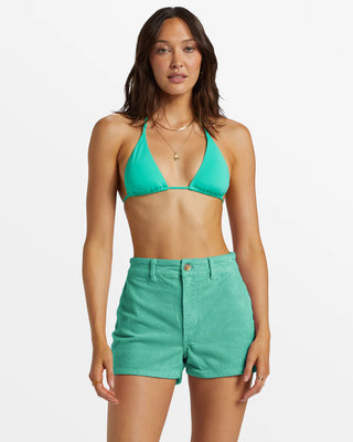 Tropical green high-waisted corduroy shorts with back patch pockets and zip fly.