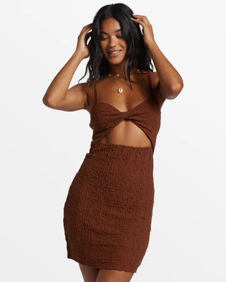 Toasted Coconut bodycon mini dress with front twist, cutout detail, and adjustable straps.