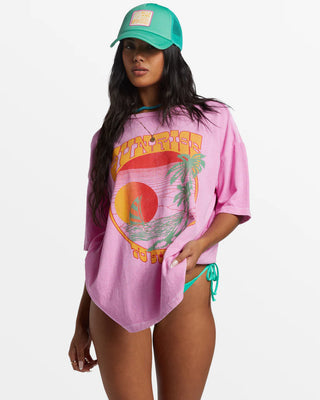 Paradise pink oversized tee with loose crew neck and screen-printed graphics, made from cotton.