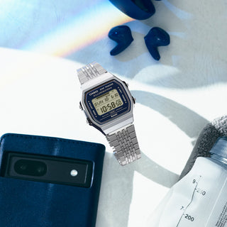 Casio Vintage ABL-100WE-2A Watch in Blue/White — classic digital display, resin case and band, LED backlight, water resistant, with auto calendar and daily alarm