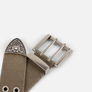 Dime Waxed Canvas Belt in Brown/Olive — waxed cotton canvas face with leather backing, double prong metal buckle, metal eyelets, and engraved metal belt tip with rhinestone detail