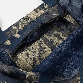 Military camo Dime distressed messenger bag with adjustable cross-body strap.
