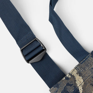 Military camo Dime distressed messenger bag with adjustable cross-body strap.