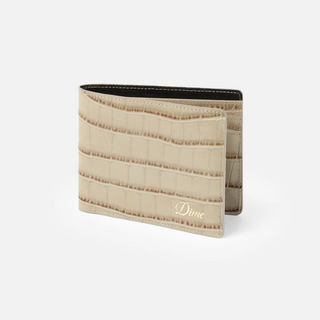Tan croc-embossed Dime bifold wallet with slim profile and stitched edges.