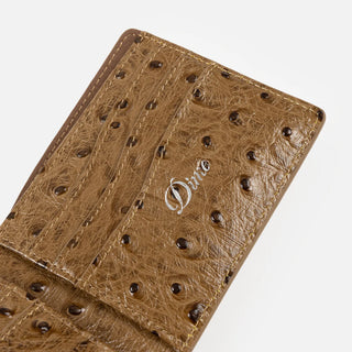 Black Dime wallet with textured finish and subtle logo detail