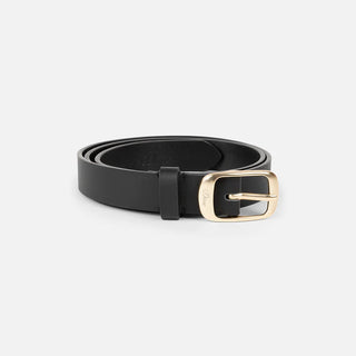Black leather belt with a gold buckle on a light gray background