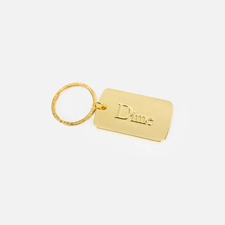 Gold keychain with engraved name on a white background