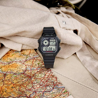 Casio Digital AE1200WH-1A black watch with world map, LED light, and multiple alarms.