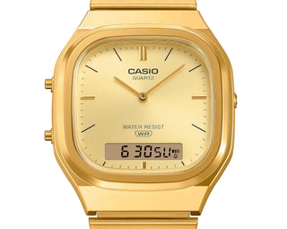 Gold Casio watch with digital display on a white background