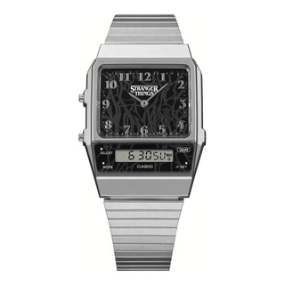 Silver Casio watch with 'Stranger Things' design on the face against a white background