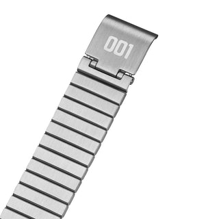 Silver watch strap with '001' marking on a white background