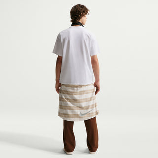 White Nike SB skate t-shirt with classic chest logo, loose fit silhouette, and ribbed crew neckline.