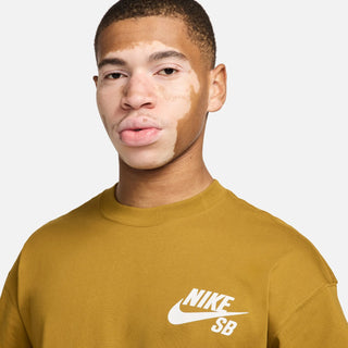 Nike SB Logo Tee in Bronzine, soft jersey fabric, classic chest logo, loose fit.
