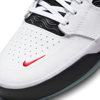 Image of the Nike SB Ishod Wair Premium Skate Shoes. The shoes feature a clean and stylish design with a suede and leather upper, responsive Zoom Air unit in the heel, and a sticky rubber outsole with a herringbone pattern.