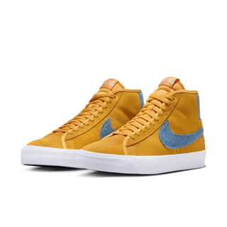 Image of Nike SB Grant Taylor Zoom Blazer Mid Pro GT, a classic '70s-inspired shoe with racing-inspired details in University Gold and Game Royal.