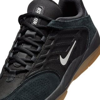 Nike SB Vertebrae in Black/Anthracite/Black/Summit White colorway with durable stitching and minimal toe layers for skateboarding.