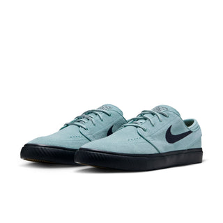Nike SB Zoom Janoski OG+ in Cannon/Black suede with Zoom Air cushioning and vulcanized sole.
