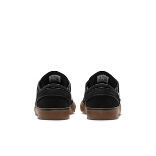 Nike SB Zoom Janoski OG+ skate shoes in Black, White, and Gum colorway with suede upper and vulcanized sole