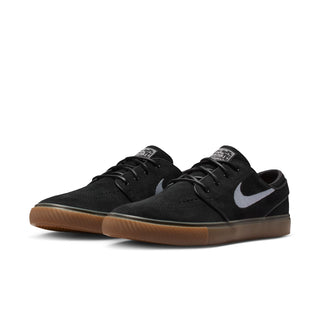 Nike SB Zoom Janoski OG+ skate shoes in Black, White, and Gum colorway with suede upper and vulcanized sole