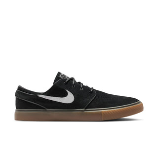 Nike SB Zoom Janoski OG+ skate shoes in Black, White, and Gum colorway with suede upper and vulcanized sole