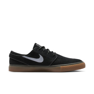 Nike SB Zoom Janoski OG+ skate shoes in Black, White, and Gum colorway with suede upper and vulcanized sole