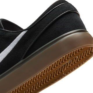 Nike SB Zoom Janoski OG+ skate shoes in Black, White, and Gum colorway with suede upper and vulcanized sole