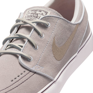 Nike SB Zoom Janoski OG+ in White/Linen Sail/Light Chocolate — suede upper, vulcanized construction, Zoom Air cushioning, skate-specific tread, 2 sets of laces