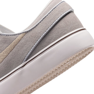 Nike SB Zoom Janoski OG+ in White/Linen Sail/Light Chocolate — suede upper, vulcanized construction, Zoom Air cushioning, skate-specific tread, 2 sets of laces
