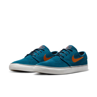 Nike SB Zoom Janoski OG+ with suede upper, Zoom Air cushioning, and vulcanized sole.