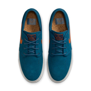 Nike SB Zoom Janoski OG+ with suede upper, Zoom Air cushioning, and vulcanized sole.