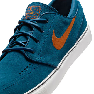 Nike SB Zoom Janoski OG+ with suede upper, Zoom Air cushioning, and vulcanized sole.