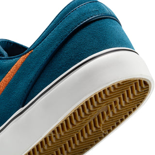 Nike SB Zoom Janoski OG+ with suede upper, Zoom Air cushioning, and vulcanized sole.