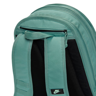 Nike Sportswear RPM 26L backpack in Cannon Black with laptop sleeve, padded straps, chest strap, and zip compartments.