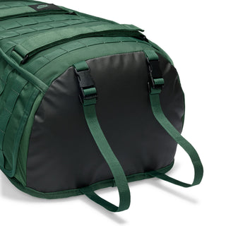 Nike SB RPM skate backpack in Fir and Black with multiple storage compartments and padded shoulder straps.