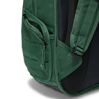 Nike SB RPM skate backpack in Fir and Black with multiple storage compartments and padded shoulder straps.