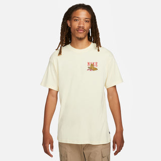 Nike SB Men's Bike Day Skate T-Shirt in Alabaster - Soft midweight cotton tee with captivating graphics and roomy fit for skate style.