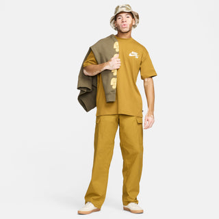 Nike SB Kearny cargo skate pants in Bronzine, durable ripstop fabric, six pockets, drawcord waist.