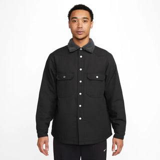 Image of the Nike SB Padded Flannel Skate Jacket in Black/Anthracite, showcasing its warmth, insulation, and durable design, ideal for skateboarding.