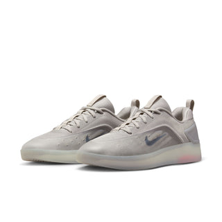 Nike SB Zoom Nyjah 4 in college grey and mink brown with reinforced mesh, Zoom Air cushioning, and HART outsole.