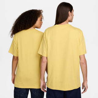 Nike SB Panther Skate T-shirt in Saturn Yellow, 100% cotton, featuring a ribbed collar and woven label.