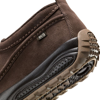 Nike ACG Izy in Baroque Brown/Sanddrift Velvet with moccasin-inspired styling, contrast stitching, zipper closure, and a rugged rubber outsole.