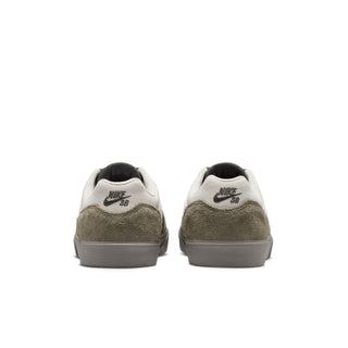 Nike SB Malor Skate Shoes in Light Bone/Light Army— vulcanized skate shoe with suede and canvas upper, extended toe bumper, cushioned collar, and herringbone grip outsole built for entry-level skaters.
