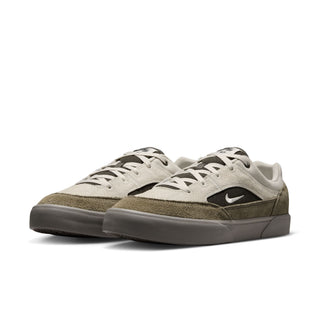 Nike SB Malor Skate Shoes in Light Bone/Light Army— vulcanized skate shoe with suede and canvas upper, extended toe bumper, cushioned collar, and herringbone grip outsole built for entry-level skaters.
